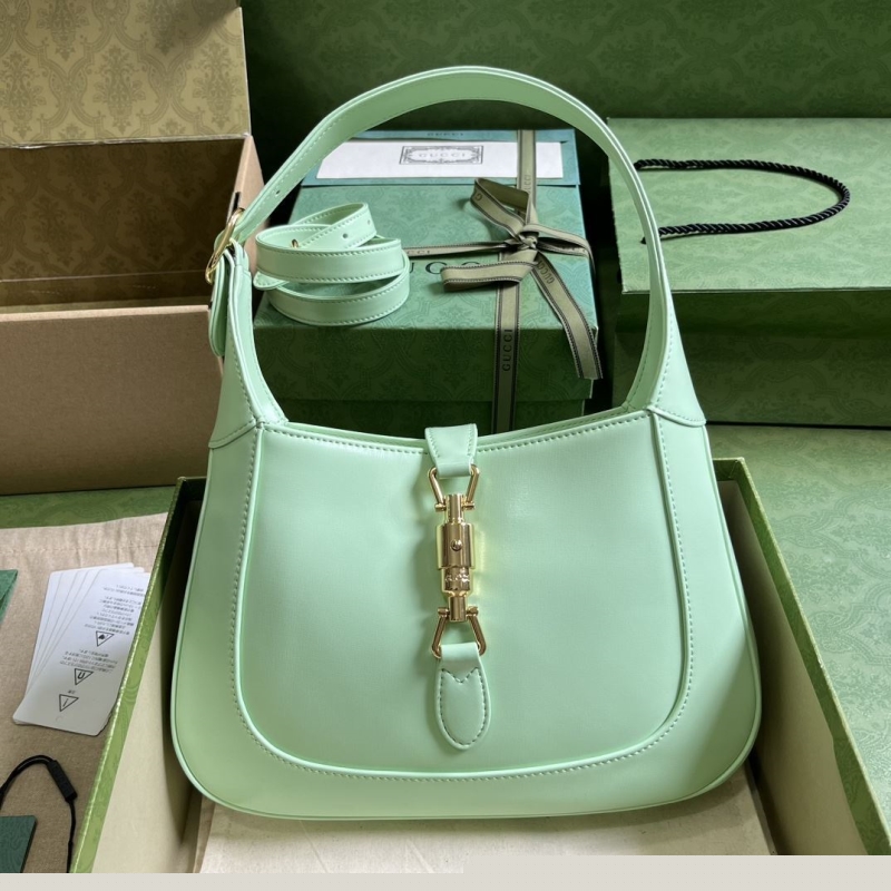 G*u*i top handle bags
